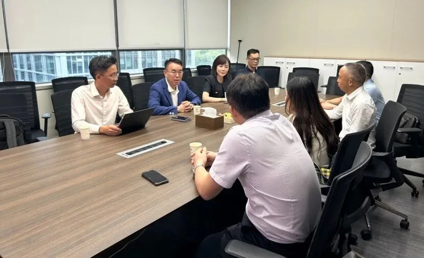 中国行为法学会粤港澳台联络处与腾越建筑科技集团交流座谈现场